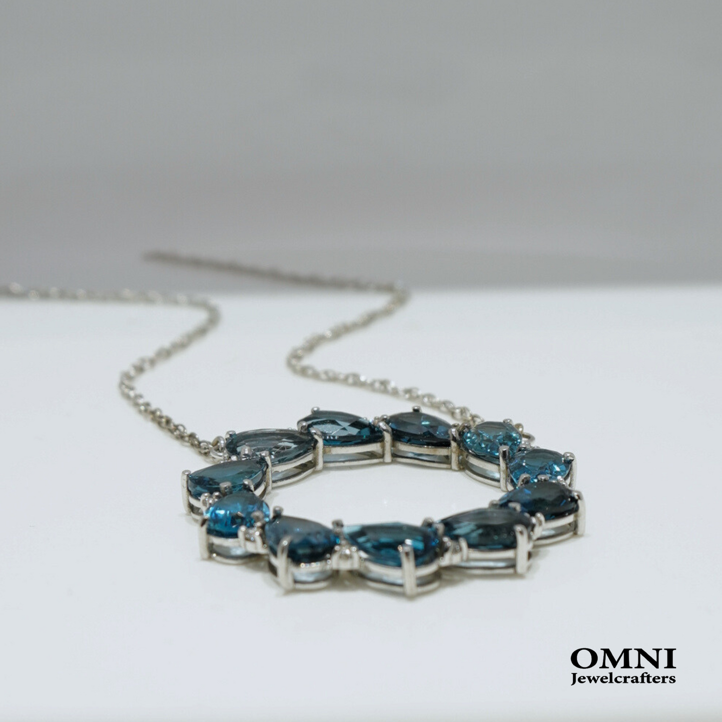 Natural Blue Topaz and Lab Grown Diamonds Pendant in 14K White Gold Necklace