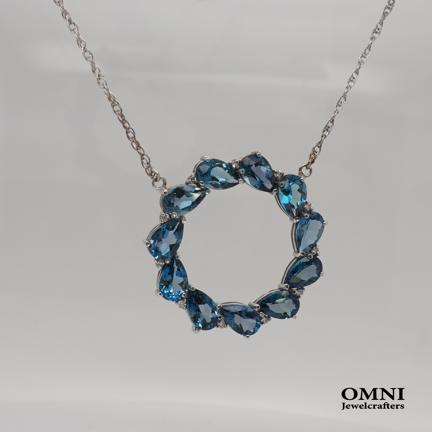Natural Blue Topaz and Lab Grown Diamonds Pendant in 14K White Gold Necklace