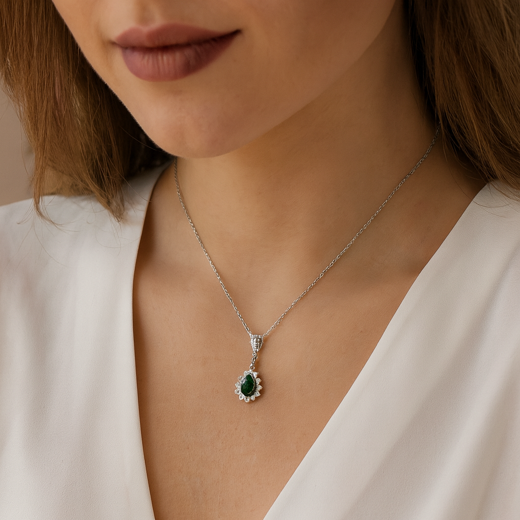 White Gold Pendant with an Emerald