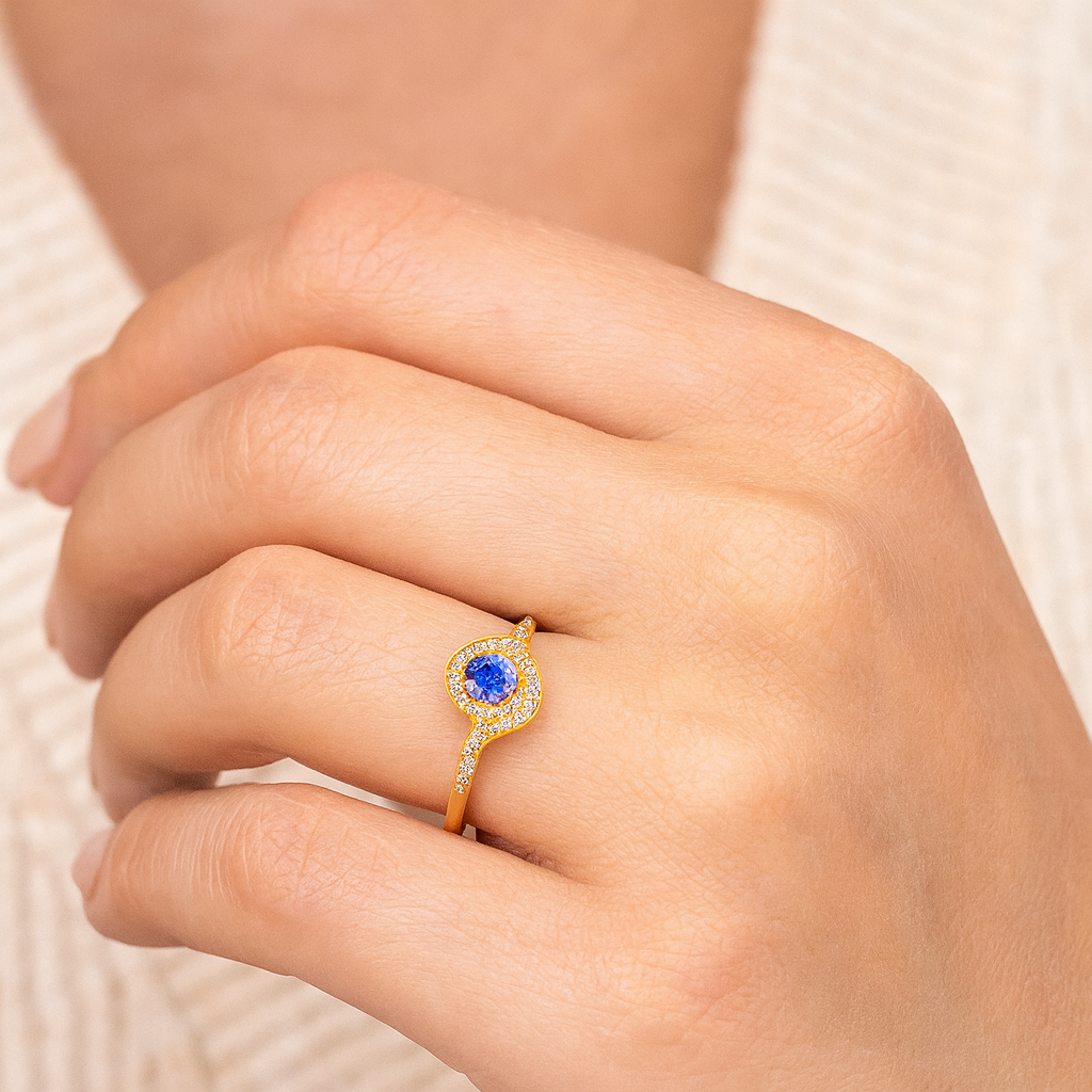 0.55 Carat Genuine Tanzanite and White Diamond 14K Yellow Gold Ring