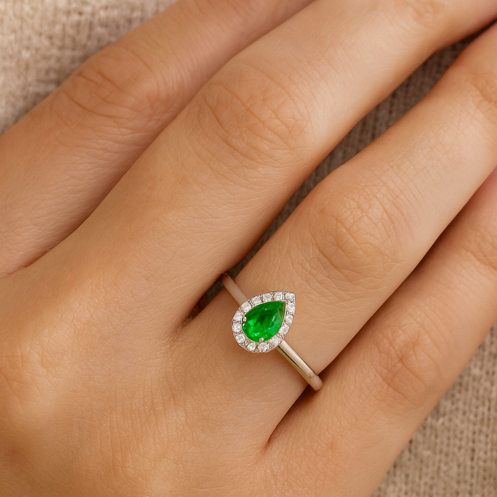 Pear Shape Emerald and Diamond Halo in 18K White Gold Ring