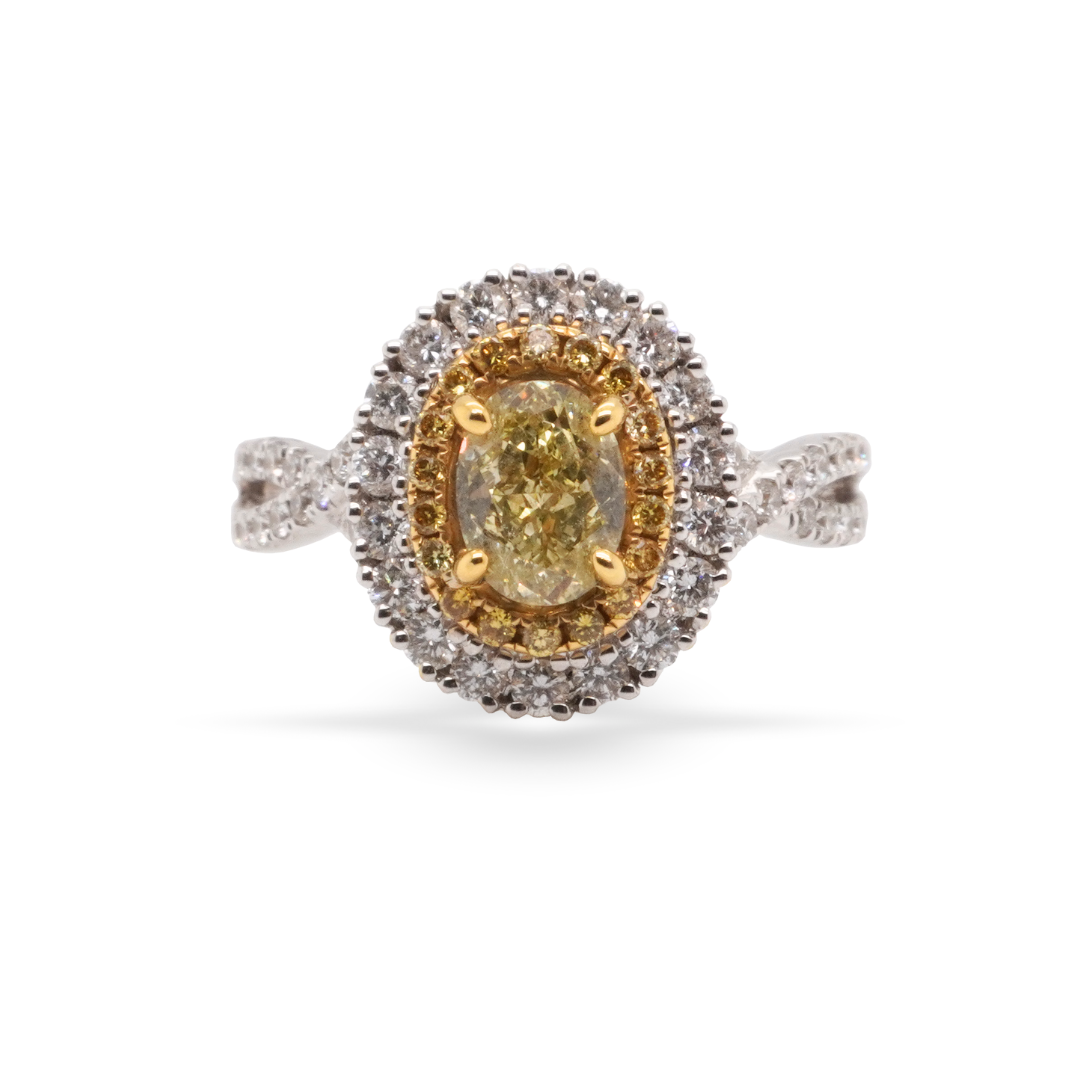 La bague de fiançailles ovale Signature avec un diamant jaune fantaisie