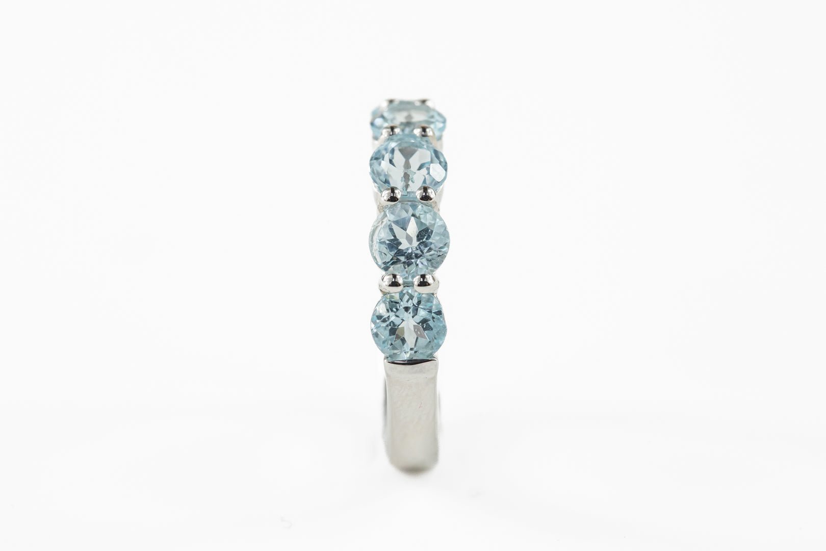 Blue Topaz Half Eternity Sterling Silver Ring - Rings - Blue Topaz Half Eternity Sterling Silver Ring - Omni Jewelcrafters