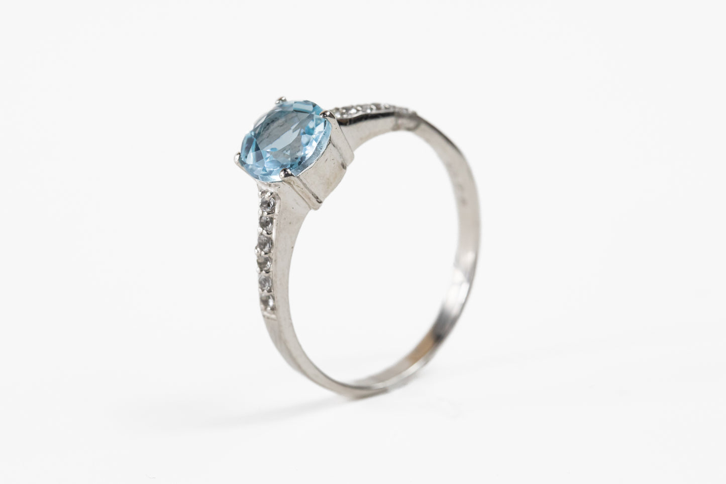 Round Blue Topaz with White Topaz Shoulder Accent in Sterling Silver Ring