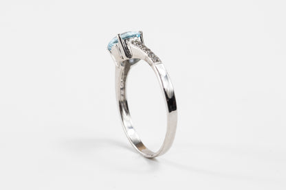 Round Blue Topaz with White Topaz Shoulder Accent in Sterling Silver Ring