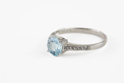 Round Blue Topaz with White Topaz Shoulder Accent in Sterling Silver Ring