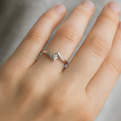14KW Tension Style Engagement Ring With a 0.06ct Diamond