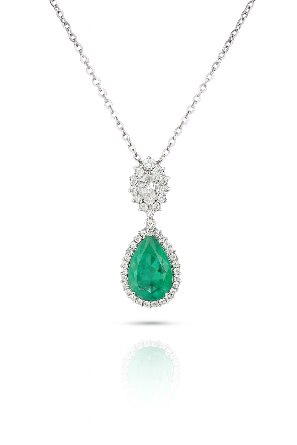 Pendentif en forme de poire avec émeraude et diamant et halo en or blanc 14 carats