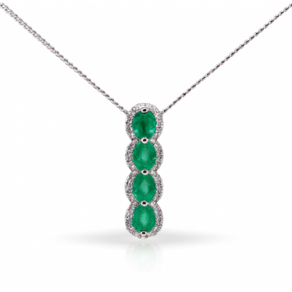 Elongated Vertical Oval Shaped Pendant With Emeralds