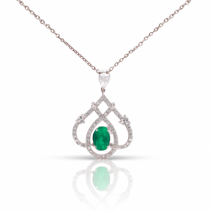 Teardrop Shaped White Gold Pendant With An Emerald
