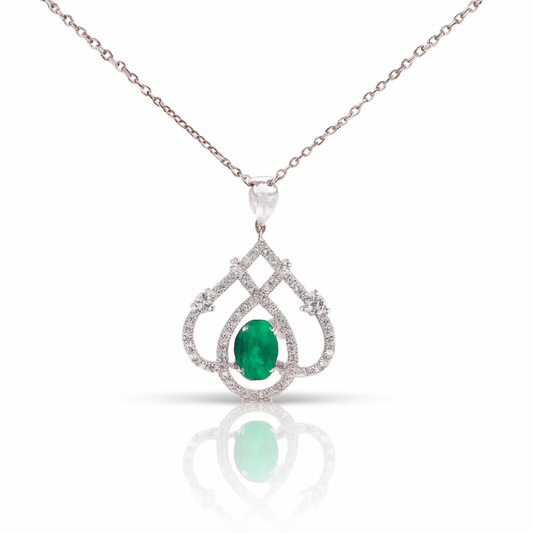 Teardrop Shaped White Gold Pendant With An Emerald