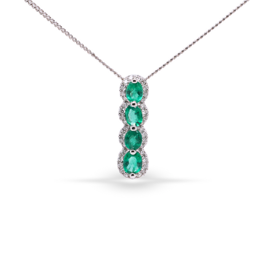 Elongated Vertical Oval Shaped Pendant With Emeralds