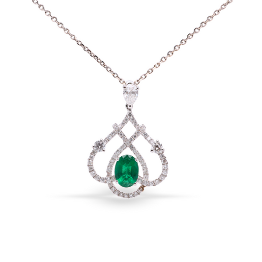 Teardrop Shaped White Gold Pendant With An Emerald