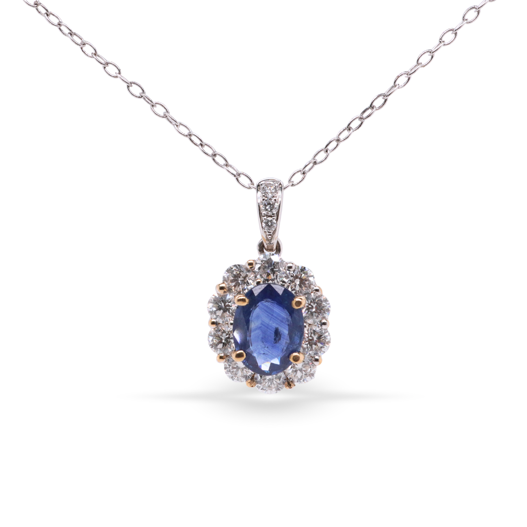 Cushion-shaped Gold Pendant With a Sapphire