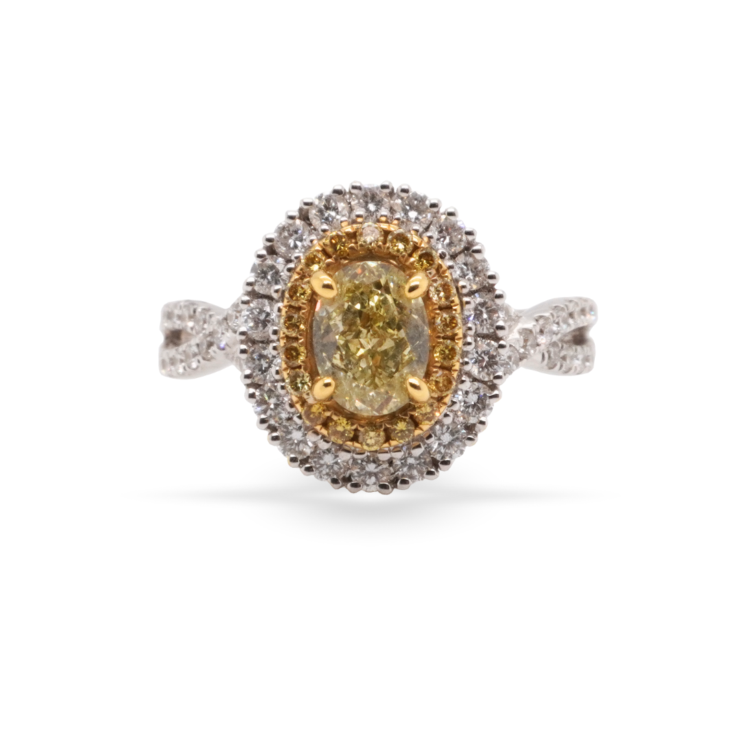 The Signature Oval Engagement Ring With A Fancy Yellow Diamond